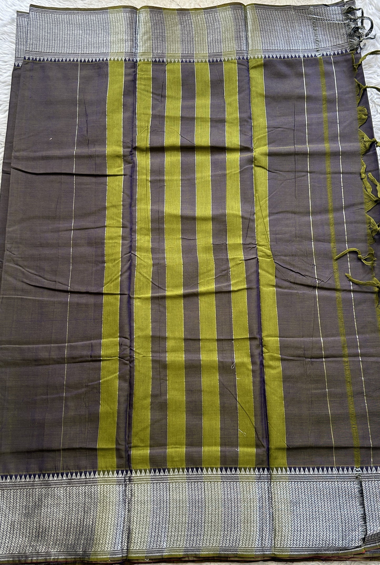 Narayanpet Cotton Saree Brinjal Colored Complemented with a Thread Border.