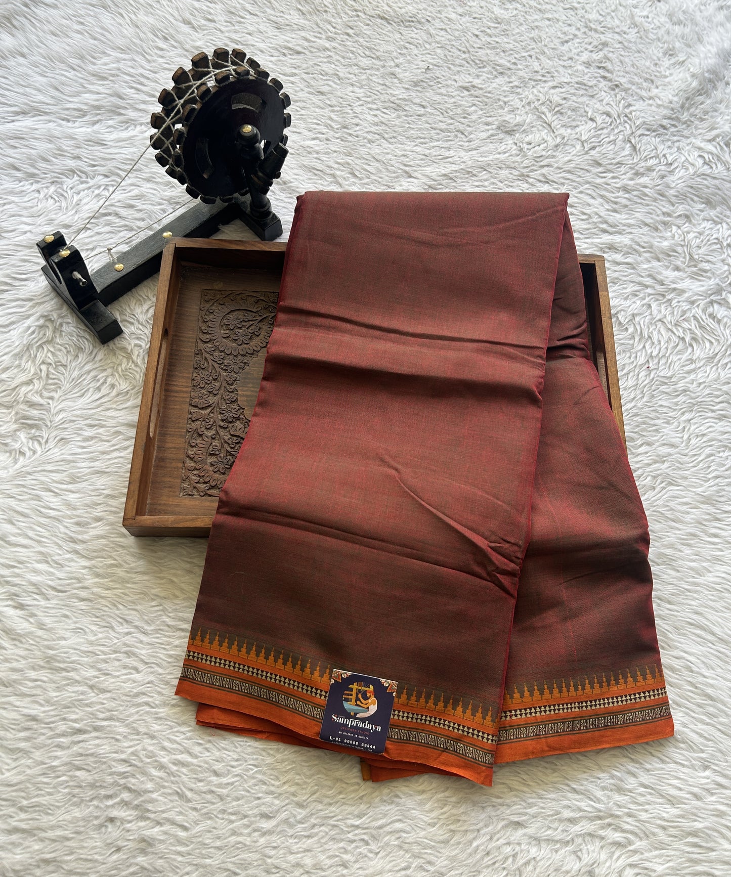 Narayanpet Cotton Saree Ginger Colored Complemented with a Thread Border.