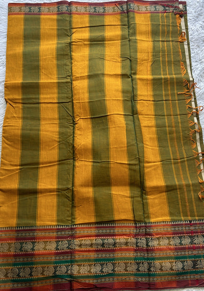 Narayanpet Cotton Saree Olive Green Colored Complemented with a Thread Border.