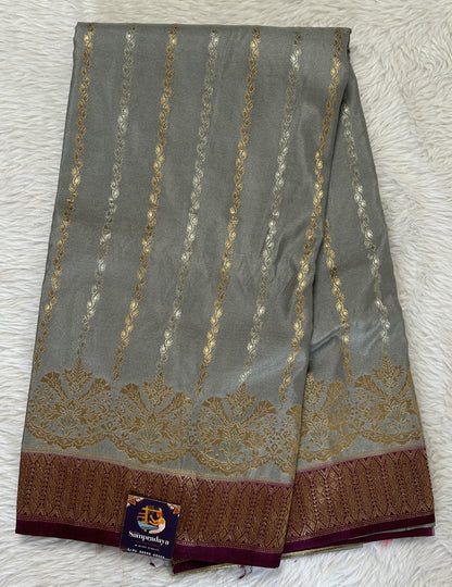 Banarasi Fancy Saree Gray Colored Complemented with a Purple Zari Border. - Sampradaya Designer Studio