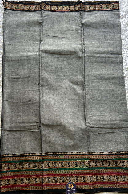 Narayanpet Cotton Saree Ash Colored Complemented with a Thread Border.