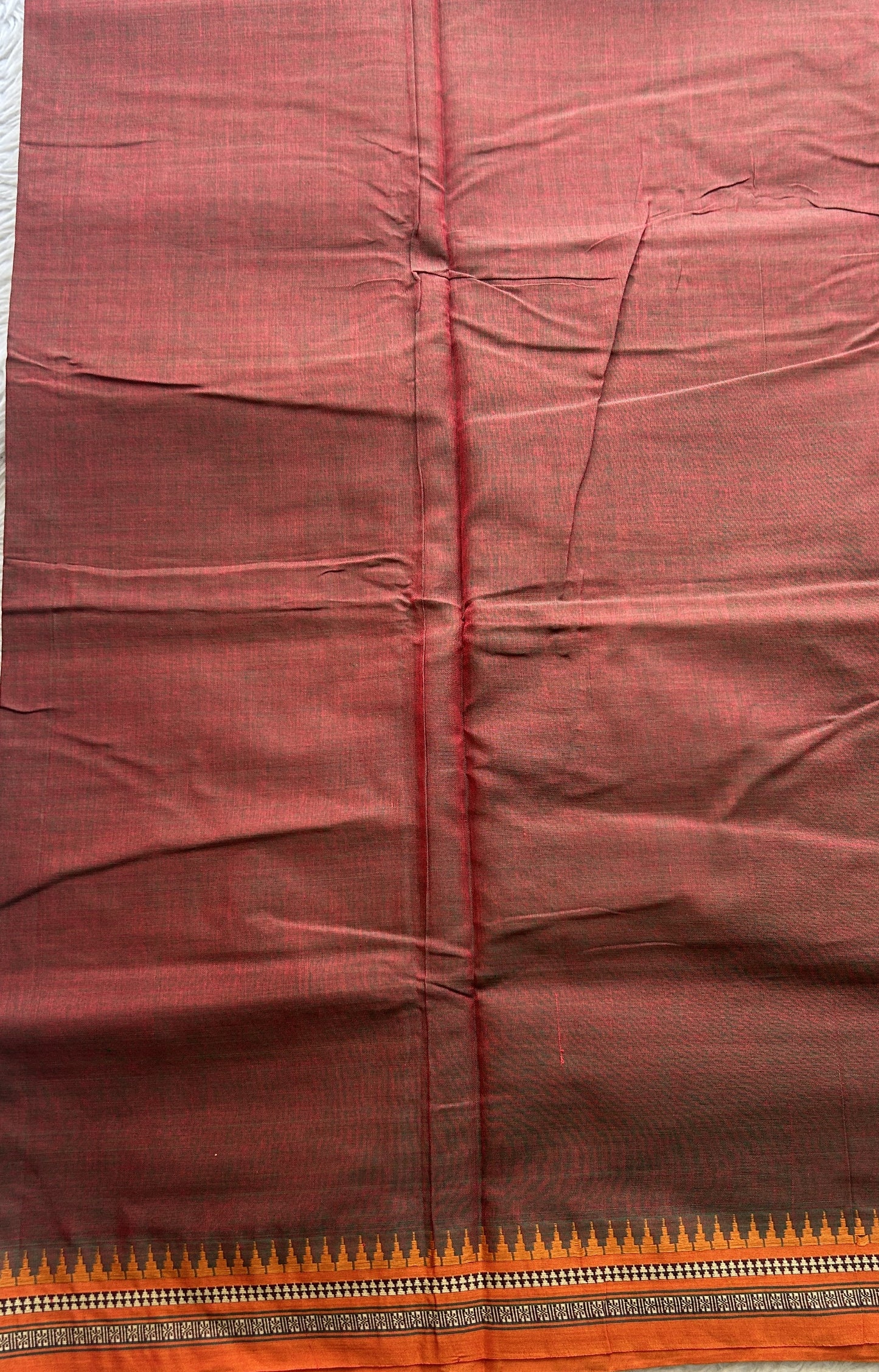 Narayanpet Cotton Saree Ginger Colored Complemented with a Thread Border.