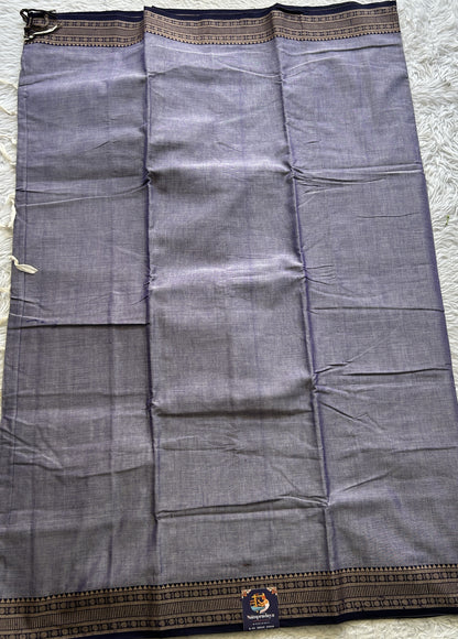 Narayanpet Cotton Saree Dark Lilac Colored Complemented with a Thread Border.