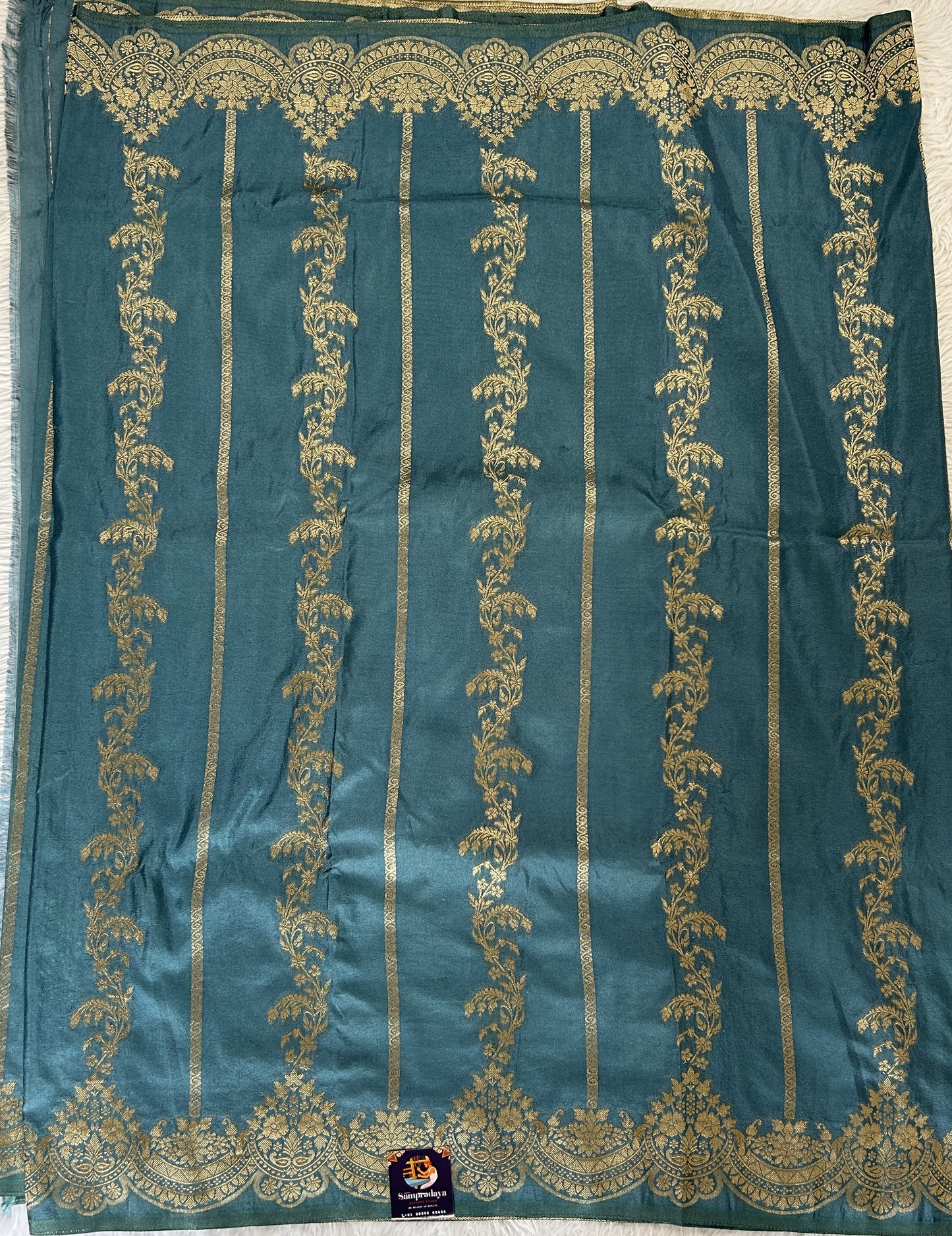 Banarasi Fancy Saree Aqua Blue Colored Complemented with a Zari Border. - Sampradaya Designer Studio