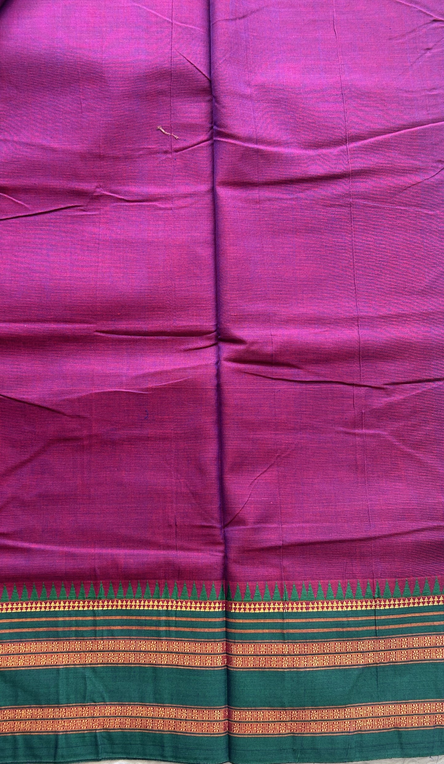 Narayanpet Cotton Saree Dark Purple Colored Complemented with a Zari Gap Border.