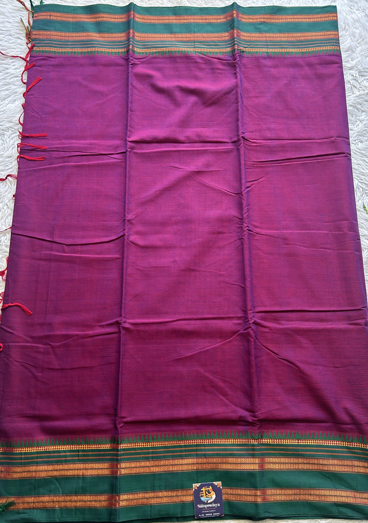 Narayanpet Cotton Saree Dark Purple Colored Complemented with a Zari Gap Border.