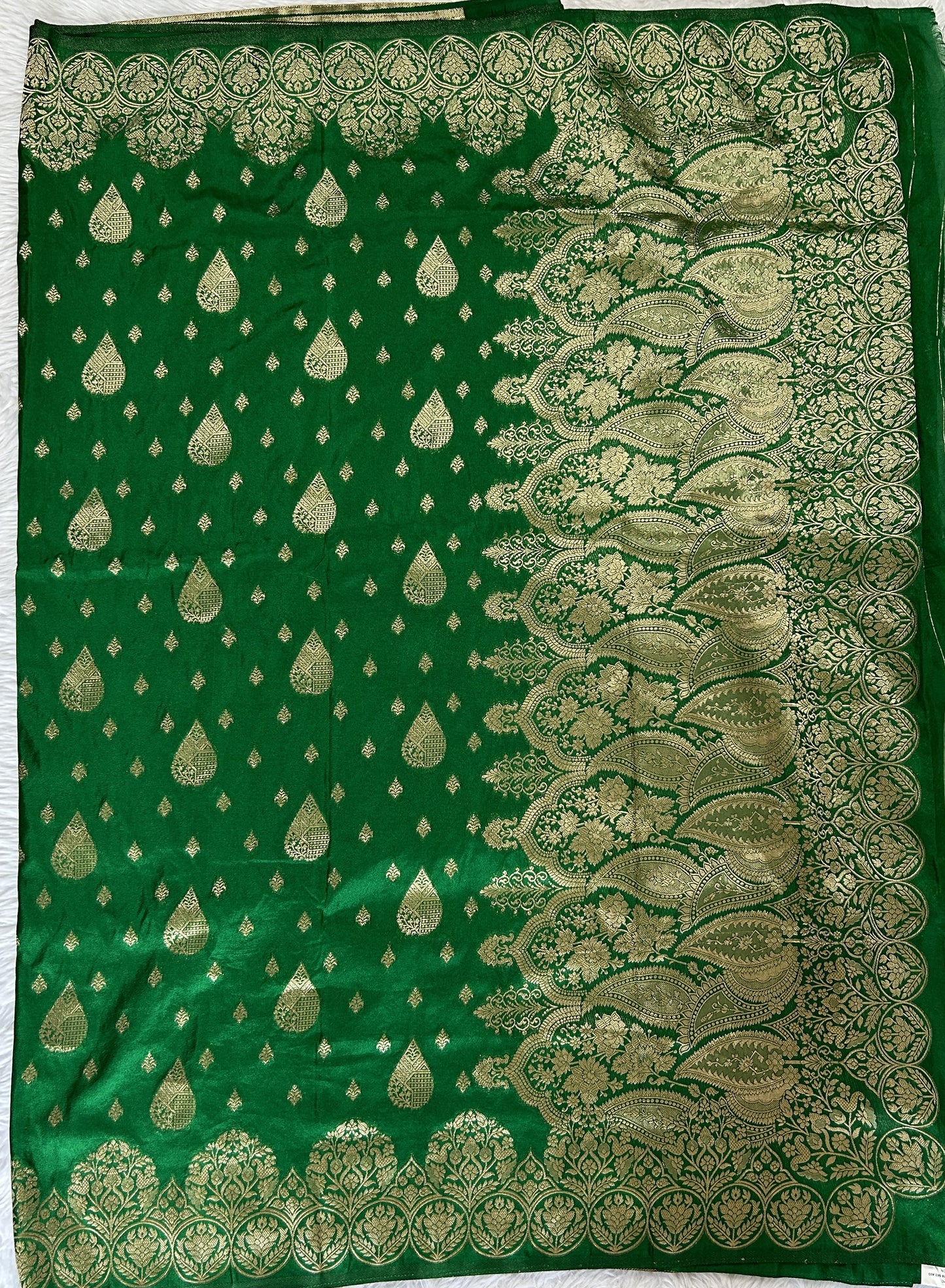 Banarasi Fancy Saree Green Colored Complemented with a Zari Border. - Sampradaya Designer Studio