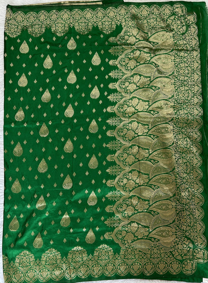 Banarasi Fancy Saree Green Colored Complemented with a Zari Border. - Sampradaya Designer Studio