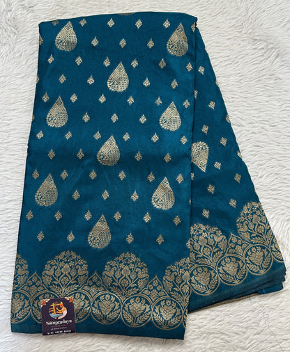 Banarasi Fancy Saree Peacock Blue Colored Complemented with a Zari Border. - Sampradaya Designer Studio