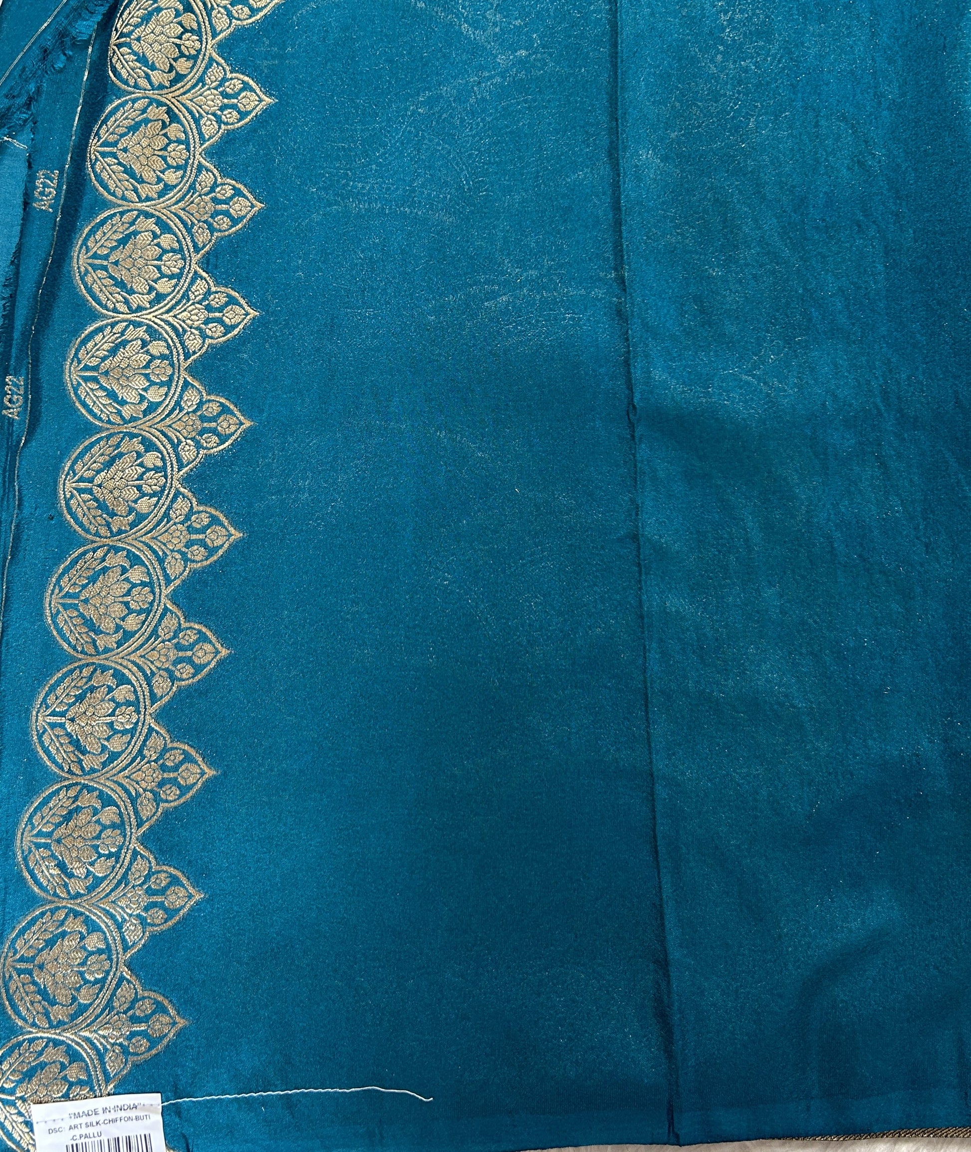 Banarasi Fancy Saree Peacock Blue Colored Complemented with a Zari Border. - Sampradaya Designer Studio