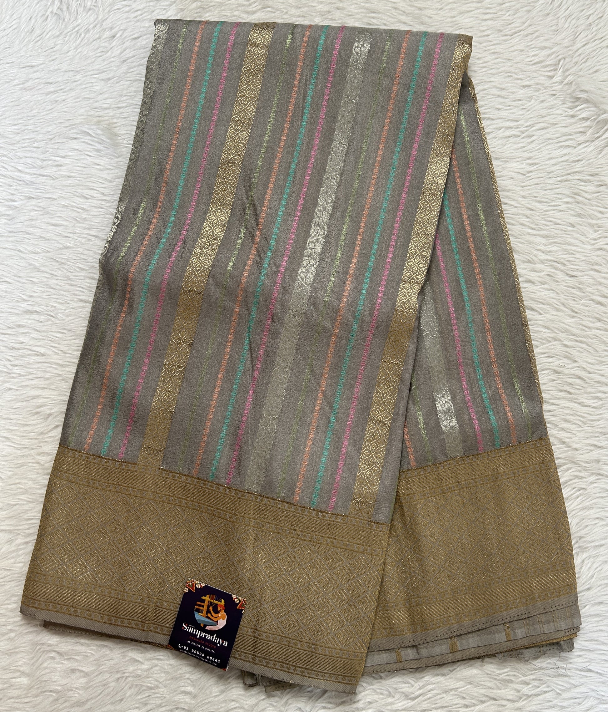 Banarasi Fancy Saree Gray Colored Complemented with a Zari Border. - Sampradaya Designer Studio