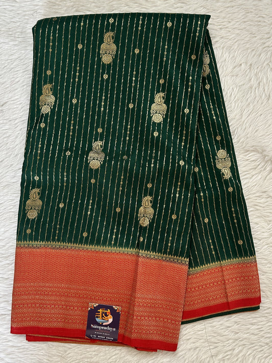 Banarasi Fancy Saree Bottle Green Colored Complemented with a Red Zari Border. - Sampradaya Designer Studio