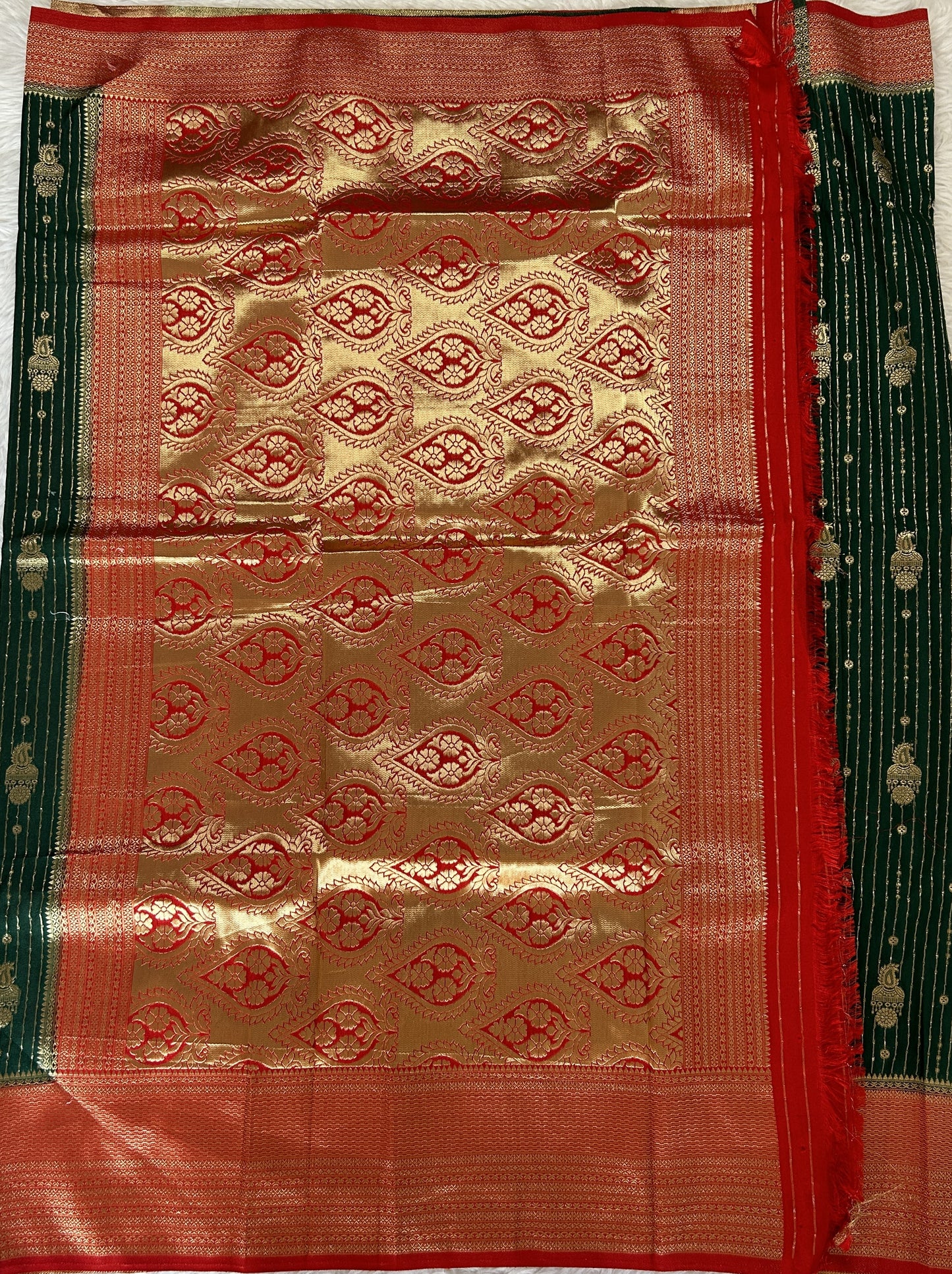 Banarasi Fancy Saree Bottle Green Colored Complemented with a Red Zari Border. - Sampradaya Designer Studio