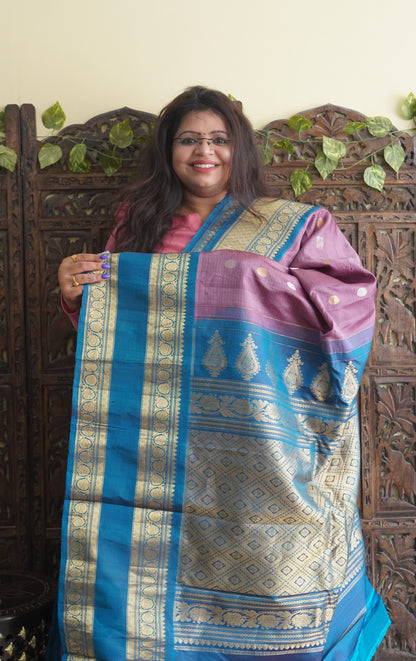 Gadwal Silk Saree Onion Pink Colored Complemented With a Zari Border