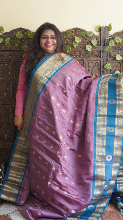 Gadwal Silk Saree Onion Pink Colored Complemented With a Zari Border