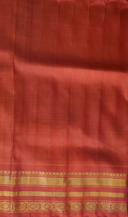 Gadwal Silk Saree Dark Yellow Colored Complemented With a Red Color Zari Border