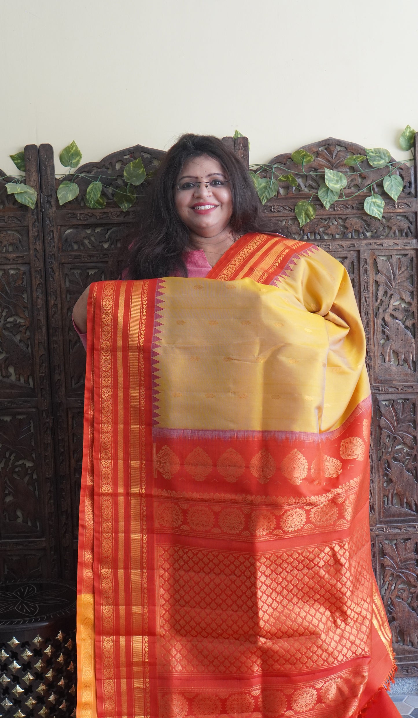 Gadwal Silk Saree Dark Yellow Colored Complemented With a Red Color Zari Border