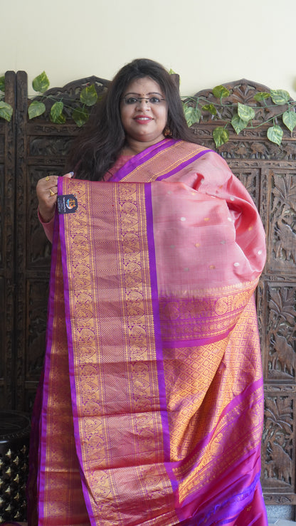 Gadwal Silk Saree Peach Colored Complemented With a Zari Border