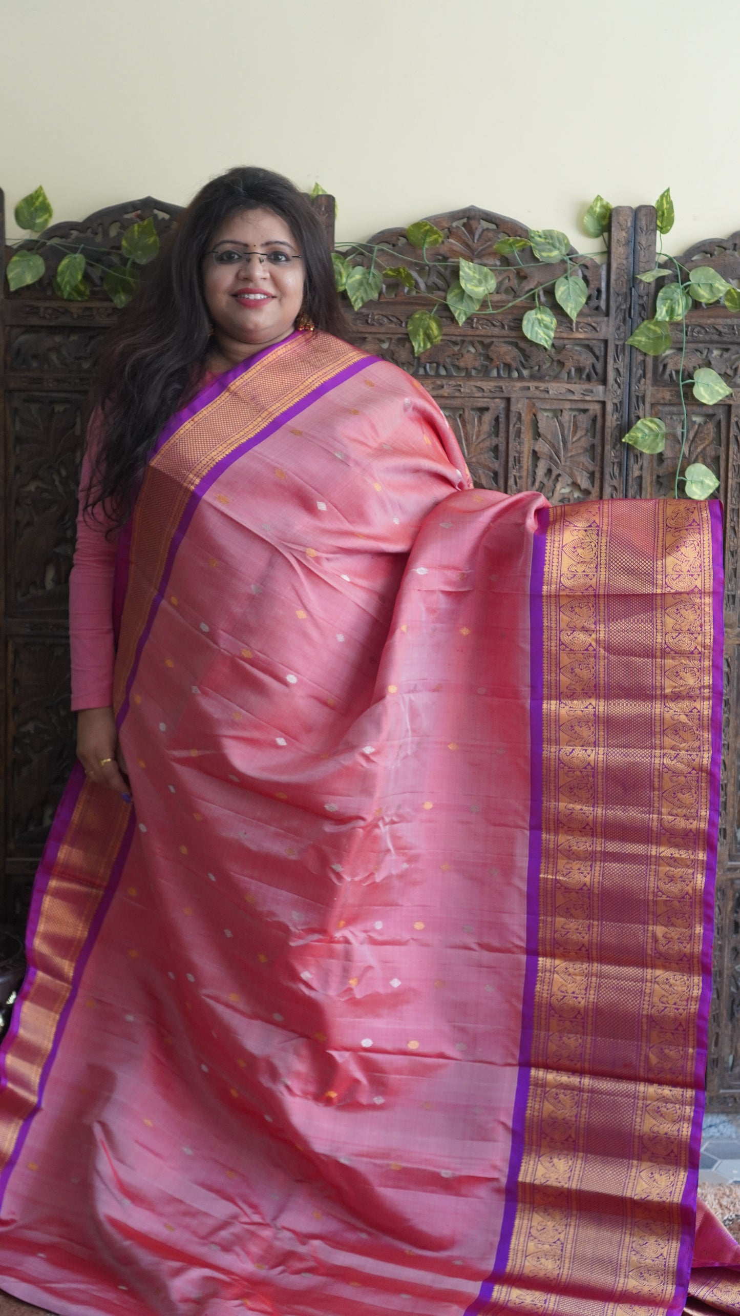 Gadwal Silk Saree Peach Colored Complemented With a Zari Border