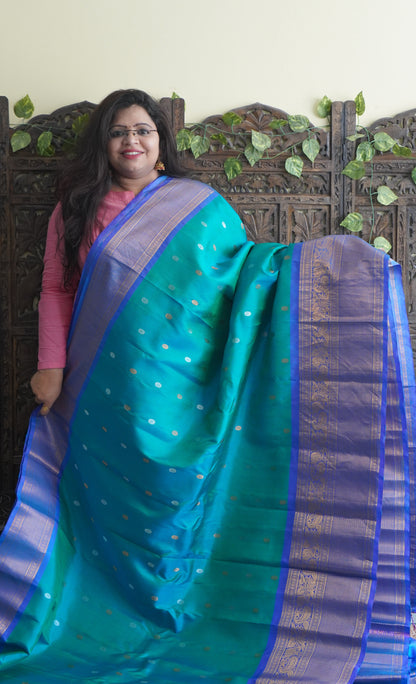 Gadwal Silk Saree Sea Green Colored Complemented With a Zari Border