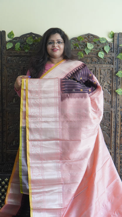 Gadwal Silk Saree Brown Colored Complemented With a Peach Zari Border