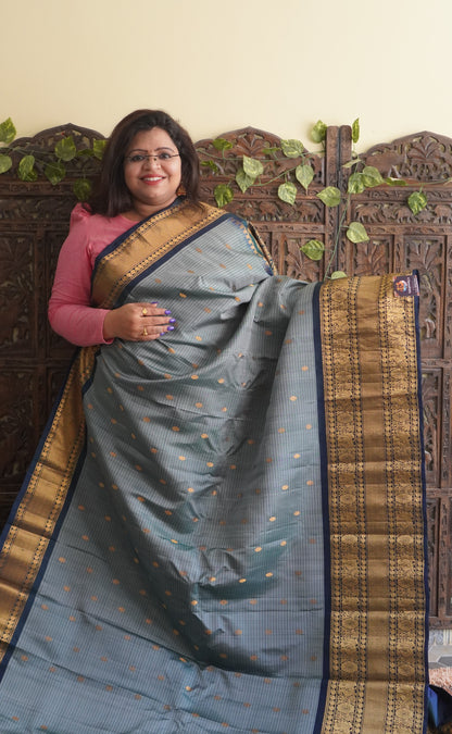 Gadwal Silk Saree Elephant Gray Colored Complemented With a Zari Border