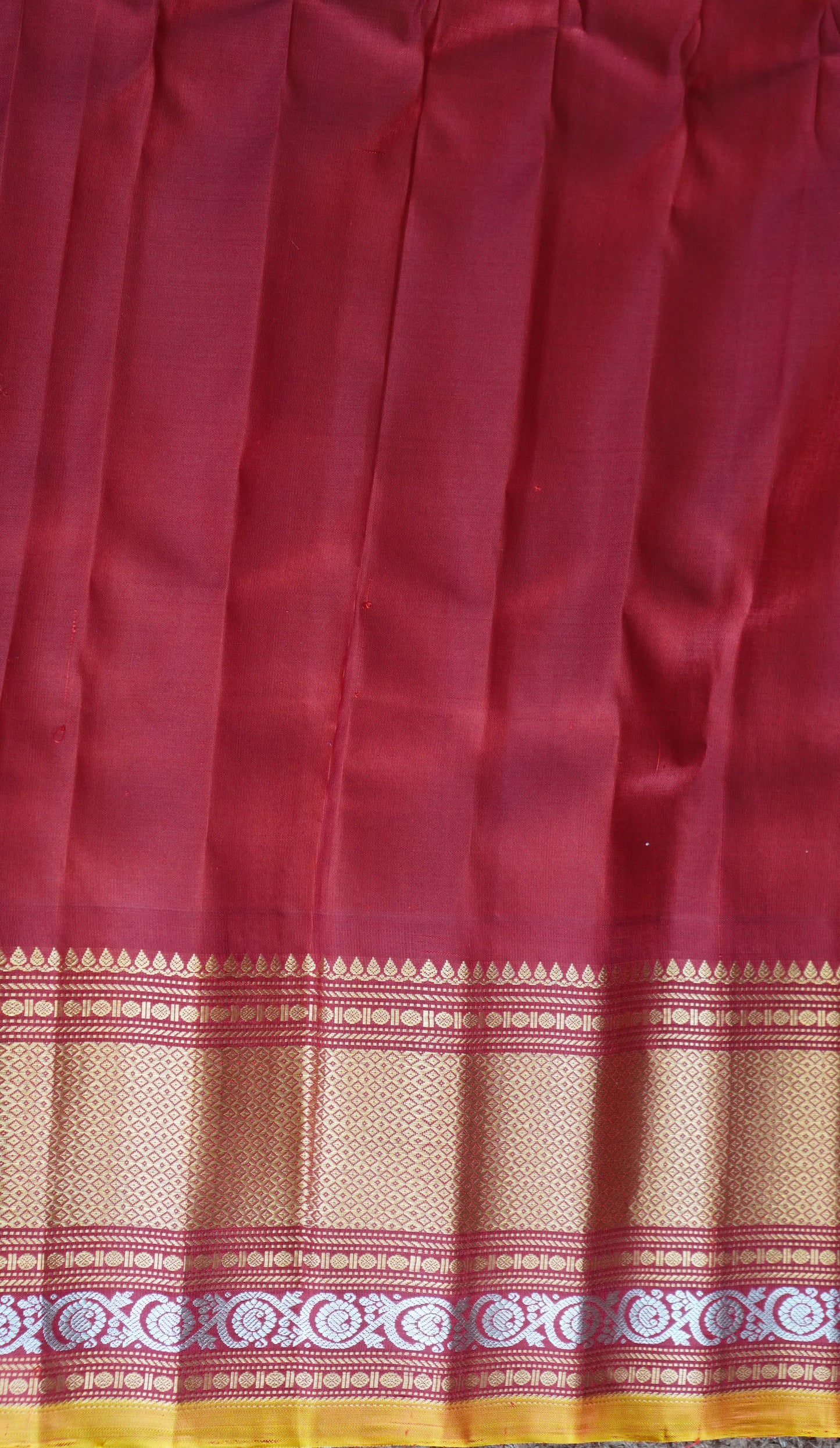 Gadwal Silk Saree Light Green Colored Complemented With a Red Zari Border