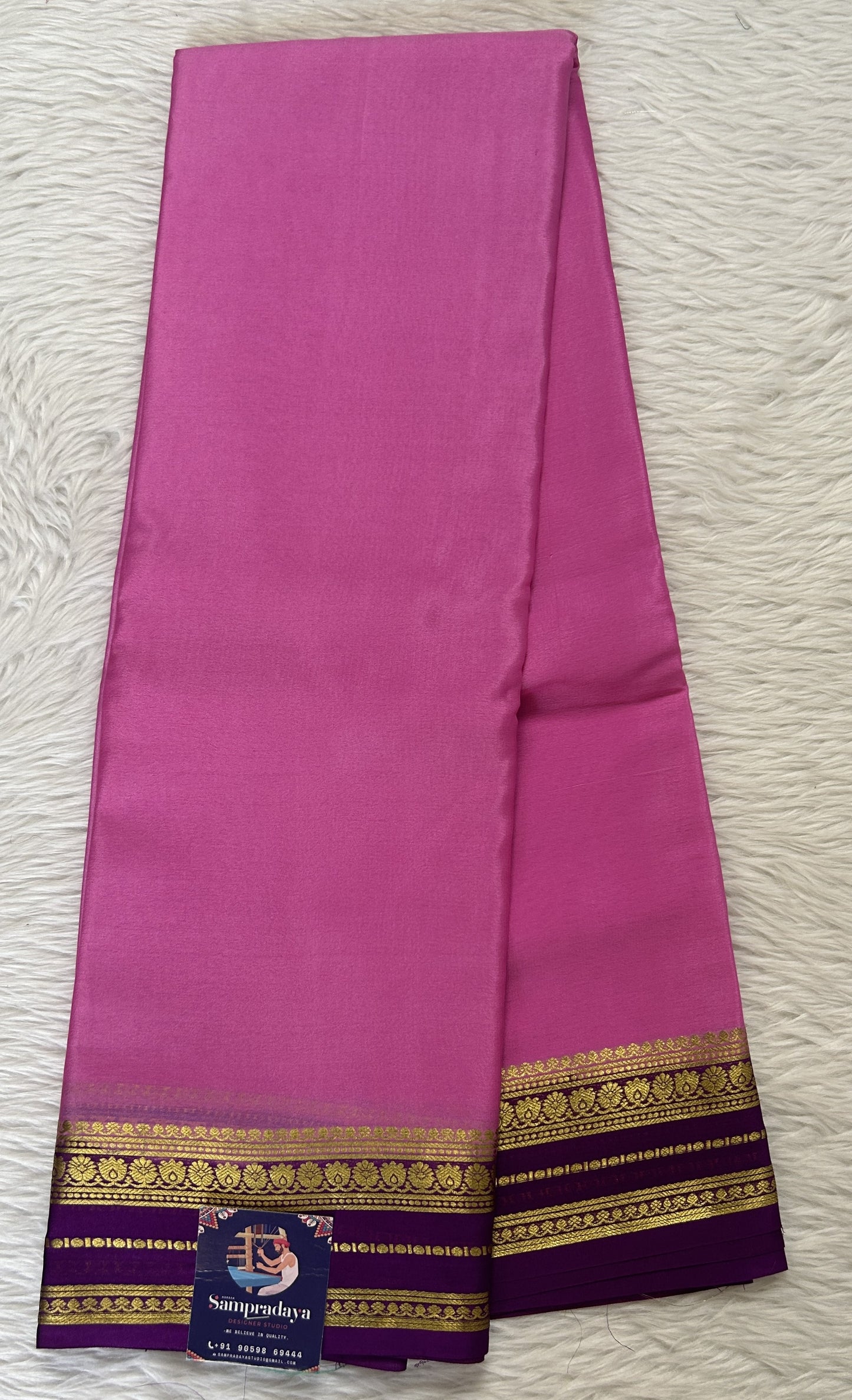 Mysore Crepe Silk Saree Pink Colored Complemented with a Purple Zari Border. - Sampradaya Designer Studio