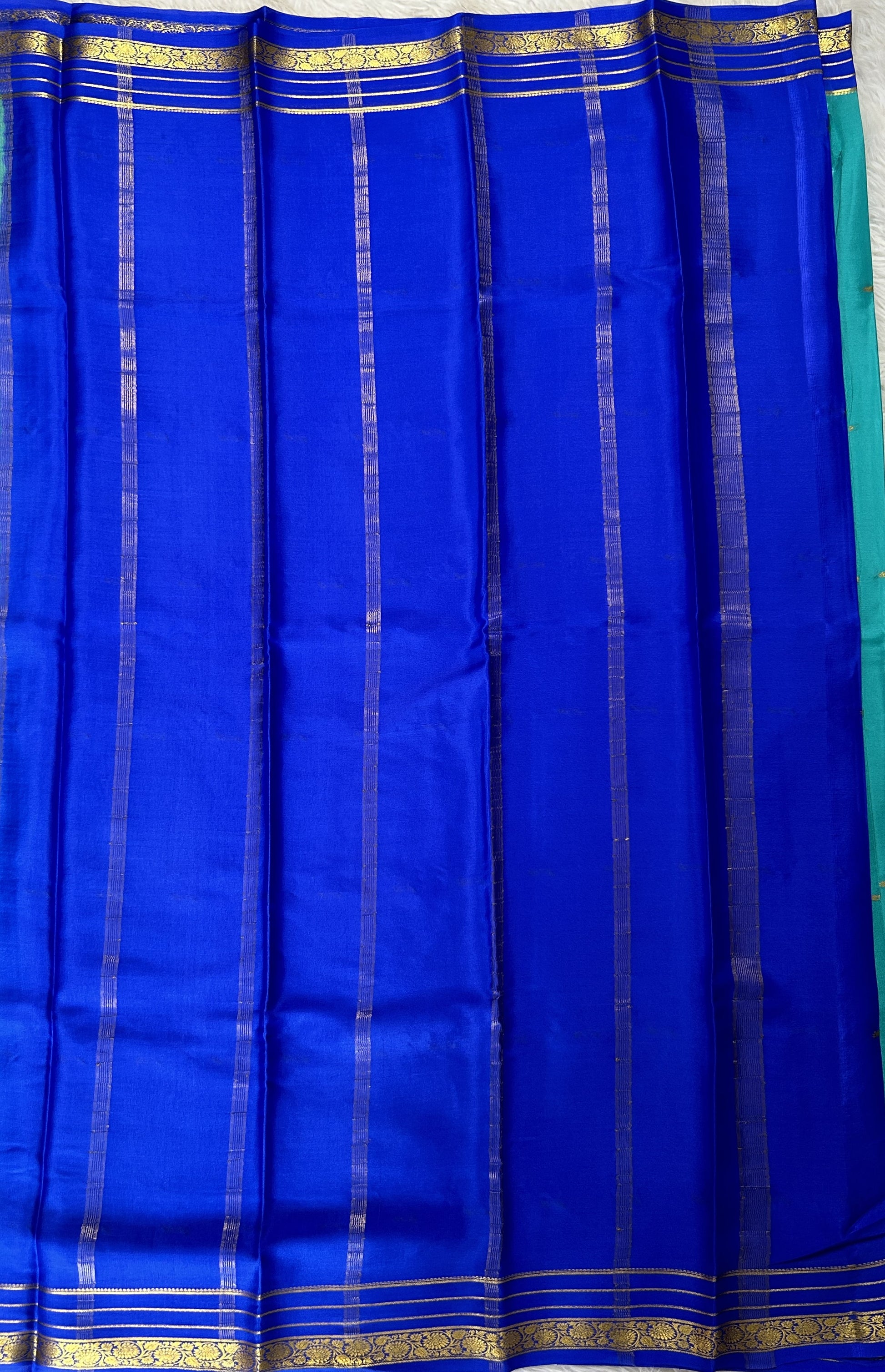 Mysore Crepe Silk Saree Sea Blue Colored Complemented with a Blue Zari Border. - Sampradaya Designer Studio