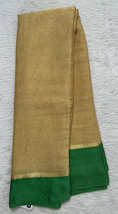 Mysore Crepe Silk Saree Cream Colored Complemented with a Green Zari Border. - Sampradaya Designer Studio