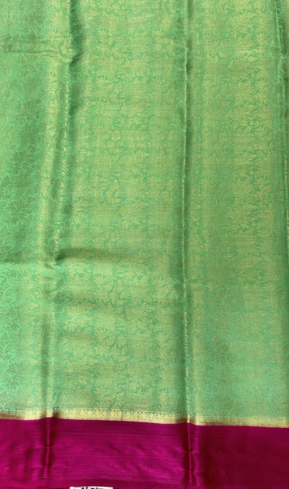 Mysore Crepe Silk Saree Green Colored Complemented with a Pink Zari Border. - Sampradaya Designer Studio