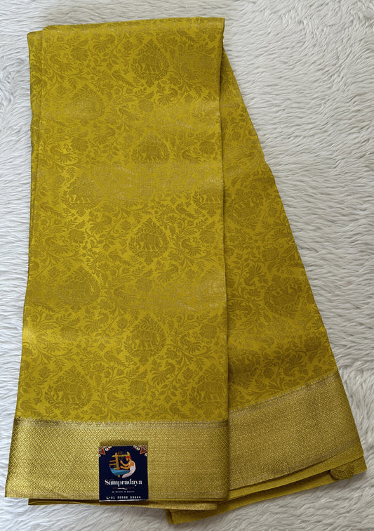 Mysore Crepe Silk Saree Yellow Colored Complemented with a Zari Border. - Sampradaya Designer Studio