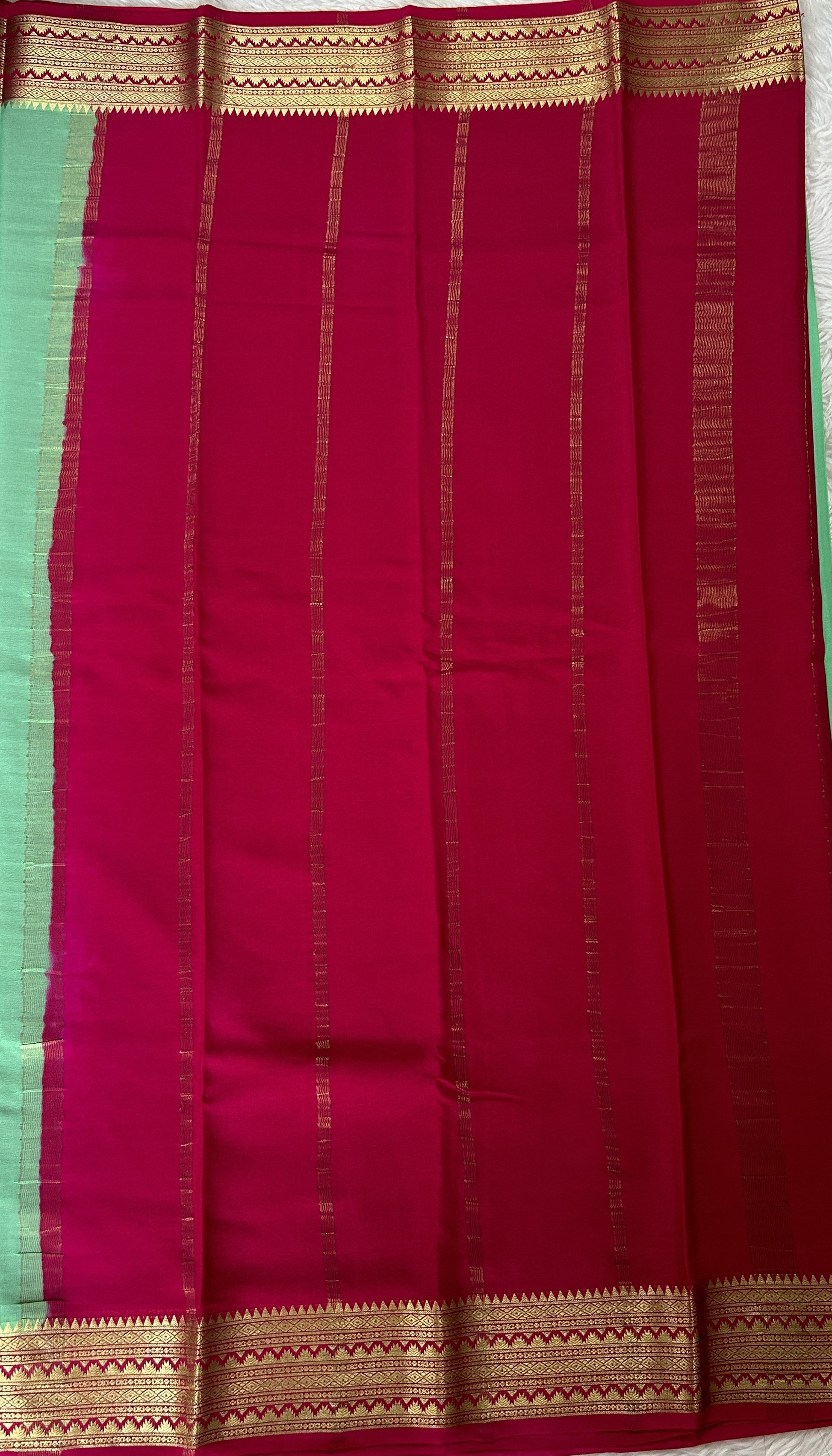 Mysore Crepe Silk Saree Light Green Colored Complemented with a Pink Zari Border. - Sampradaya Designer Studio