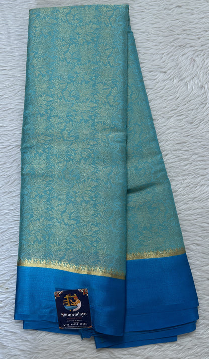 Mysore Crepe Silk Saree Sky Blue Colored Complemented with a Blue Zari Border. - Sampradaya Designer Studio