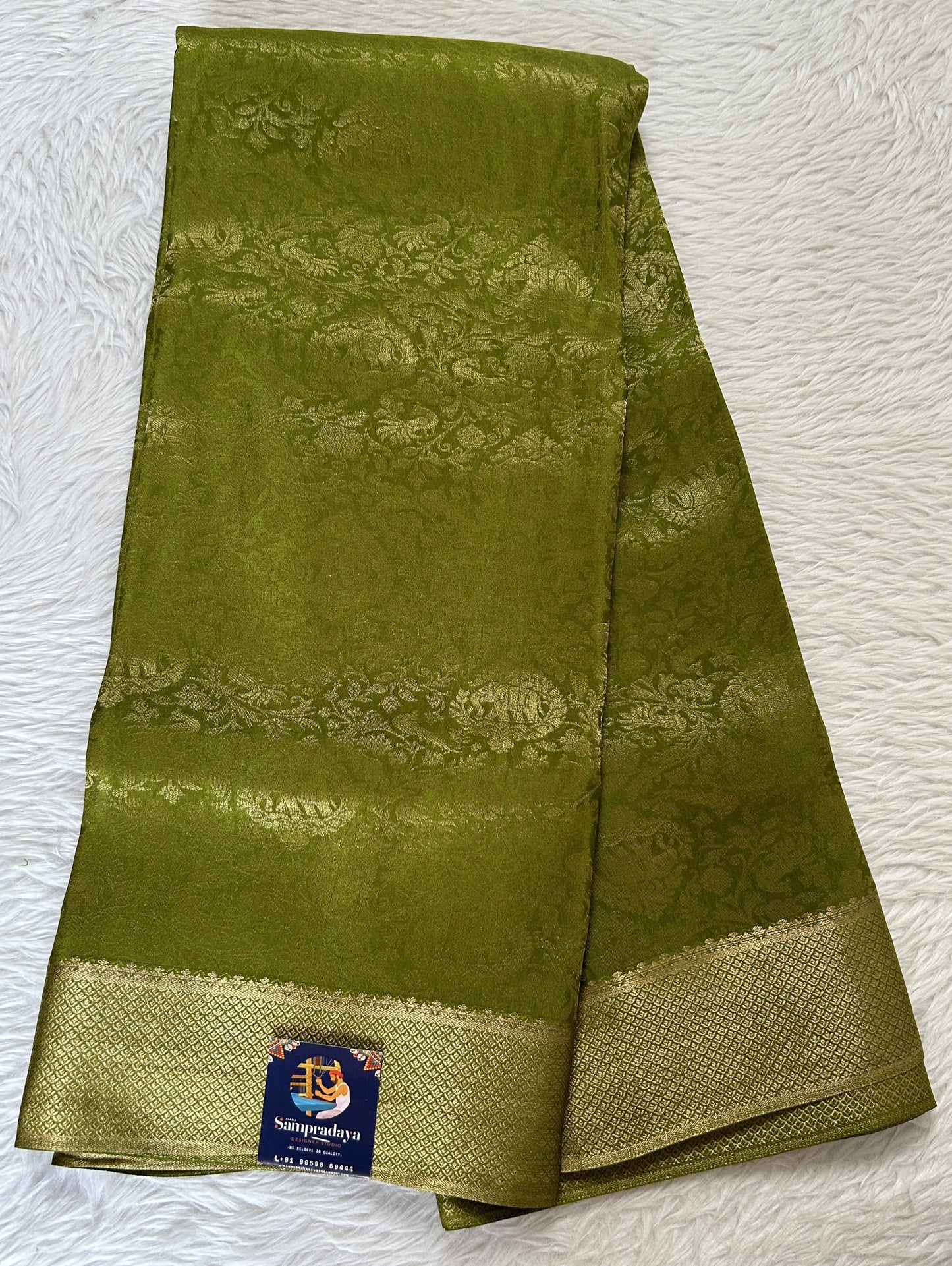 Mysore Crepe Silk Saree Green Colored Complemented with a Zari Border. - Sampradaya Designer Studio