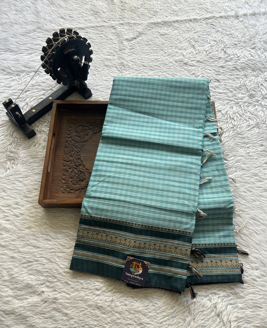 Narayanpet Cotton Checks Saree Sky Blue Colored Complemented with a Thread Gap Border.