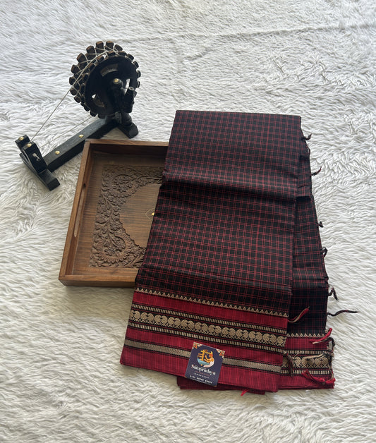 Narayanpet Cotton Checks Saree Black Colored Complemented with a Maroon Thread Border.