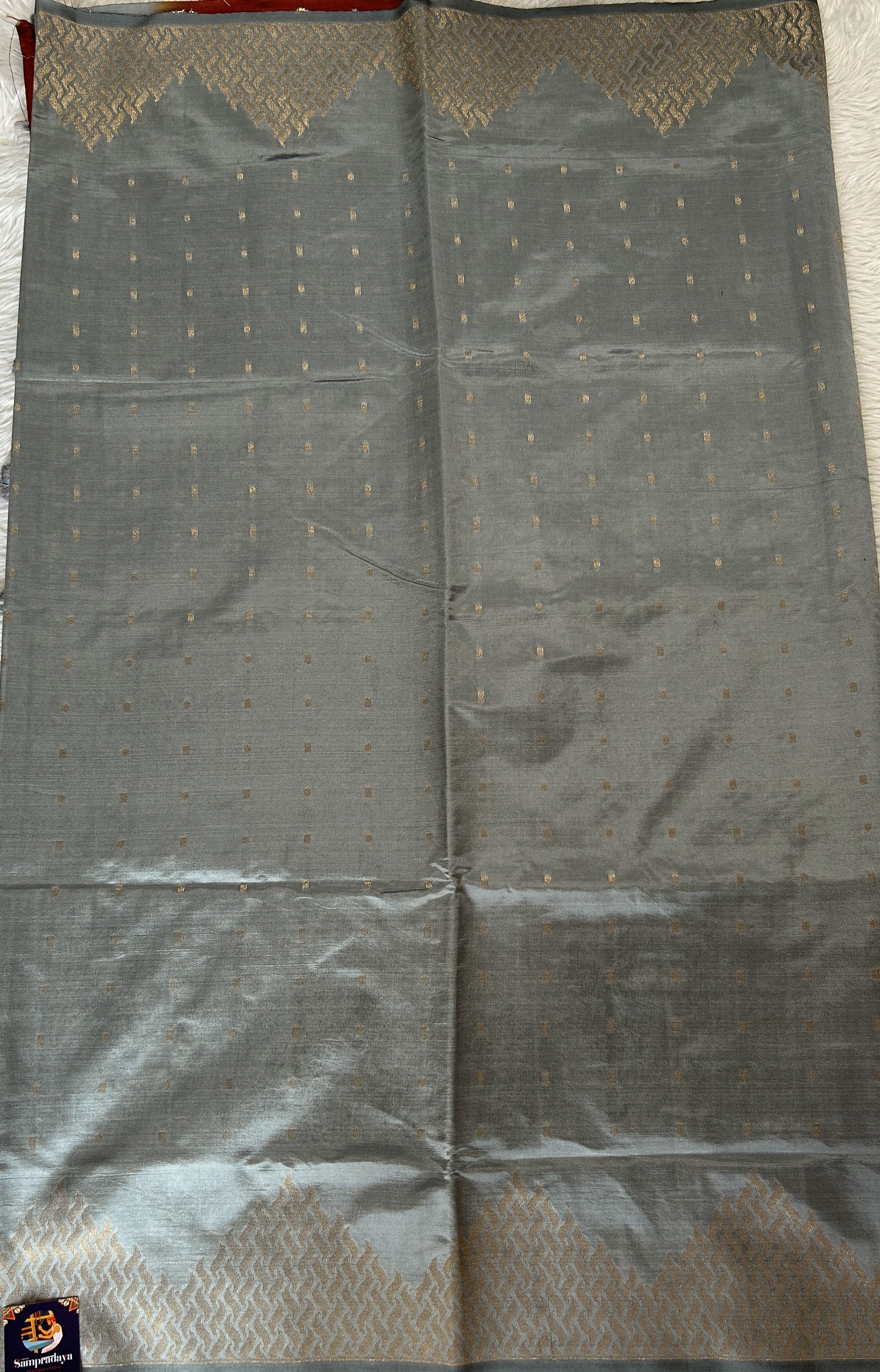 Semi Raw Silk Saree Gray Colored Complemented with a Zari Border. - Sampradaya Designer Studio