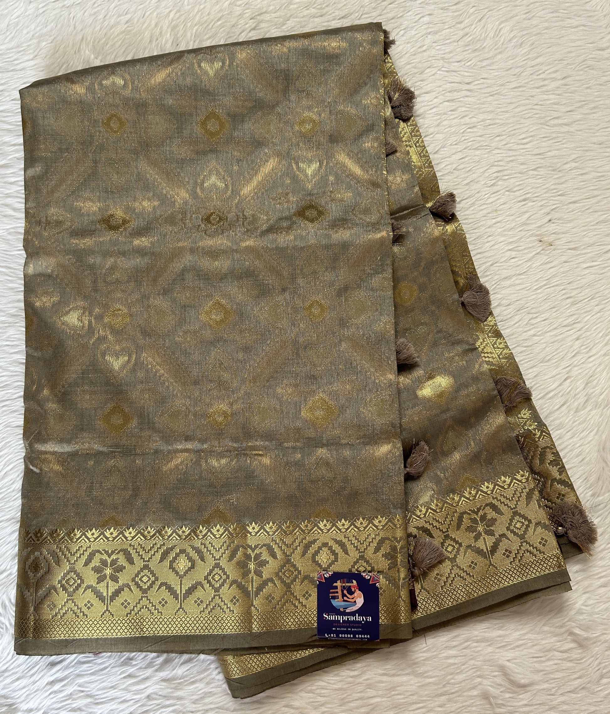 Semi Raw Silk Saree Gray Colored Complemented with a Zari Border. - Sampradaya Designer Studio