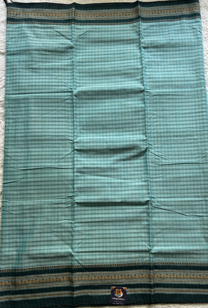 Narayanpet Cotton Checks Saree Sky Blue Colored Complemented with a Thread Gap Border.