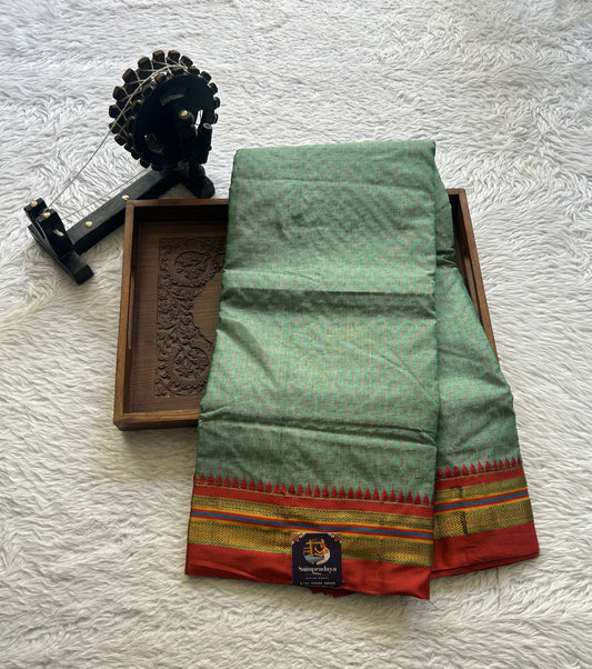 Narayanpet Cotton Saree Light Green Colored Complemented with a Zari Border.