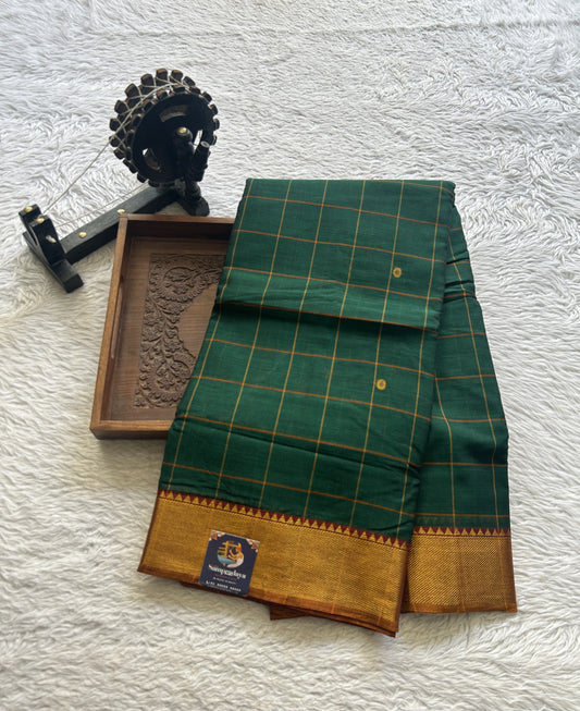 Narayanpet Cotton Checks Saree Bottle Green Colored Complemented with a Zari Border.