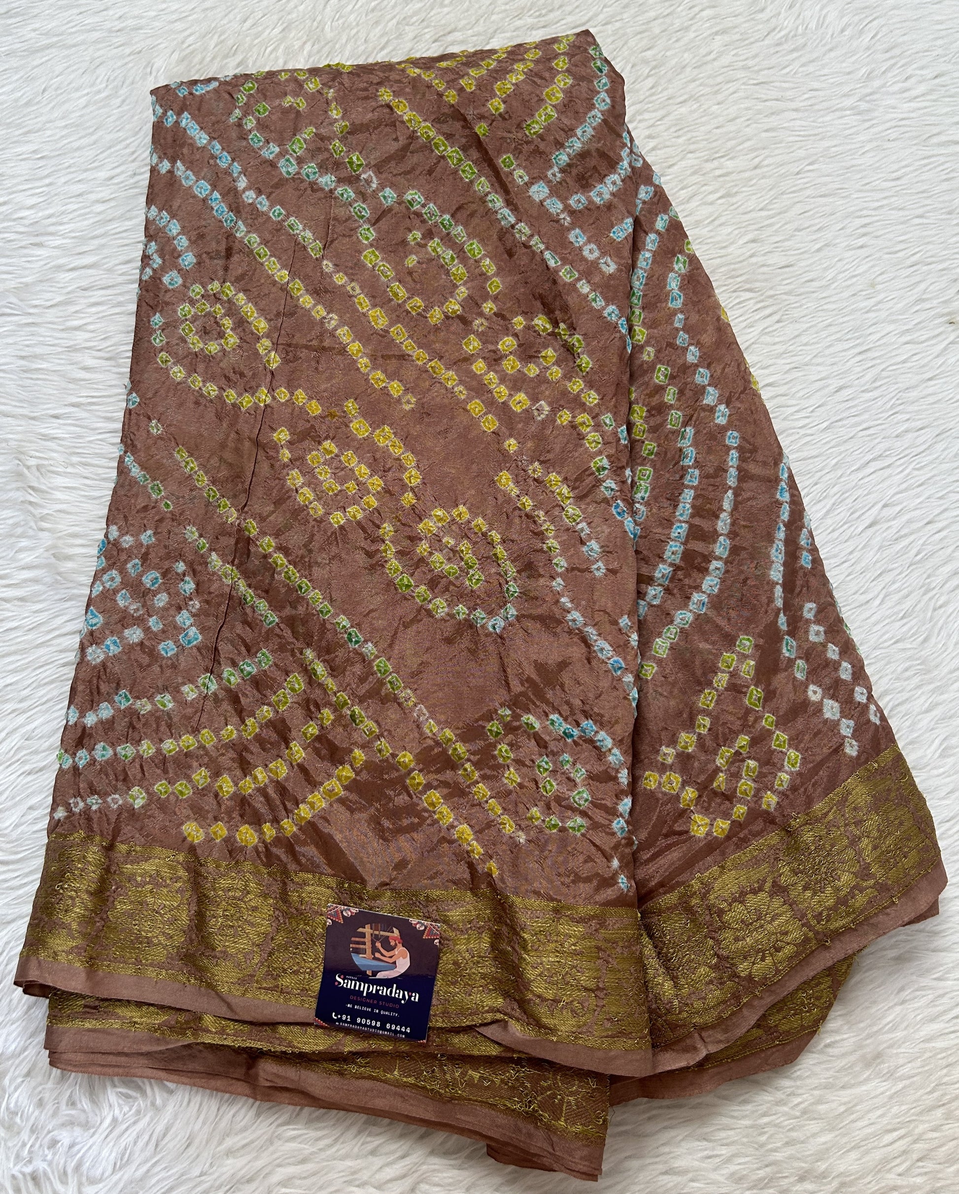 Bandhani Saree Pastel Brown Colored Complemented with a Zari Border. - Sampradaya Designer Studio