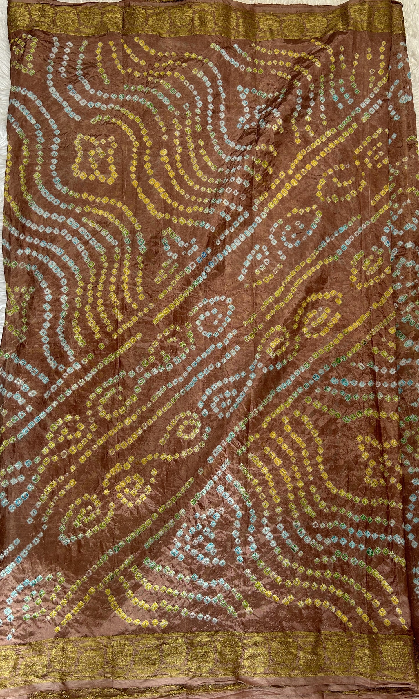 Bandhani Saree Pastel Brown Colored Complemented with a Zari Border. - Sampradaya Designer Studio