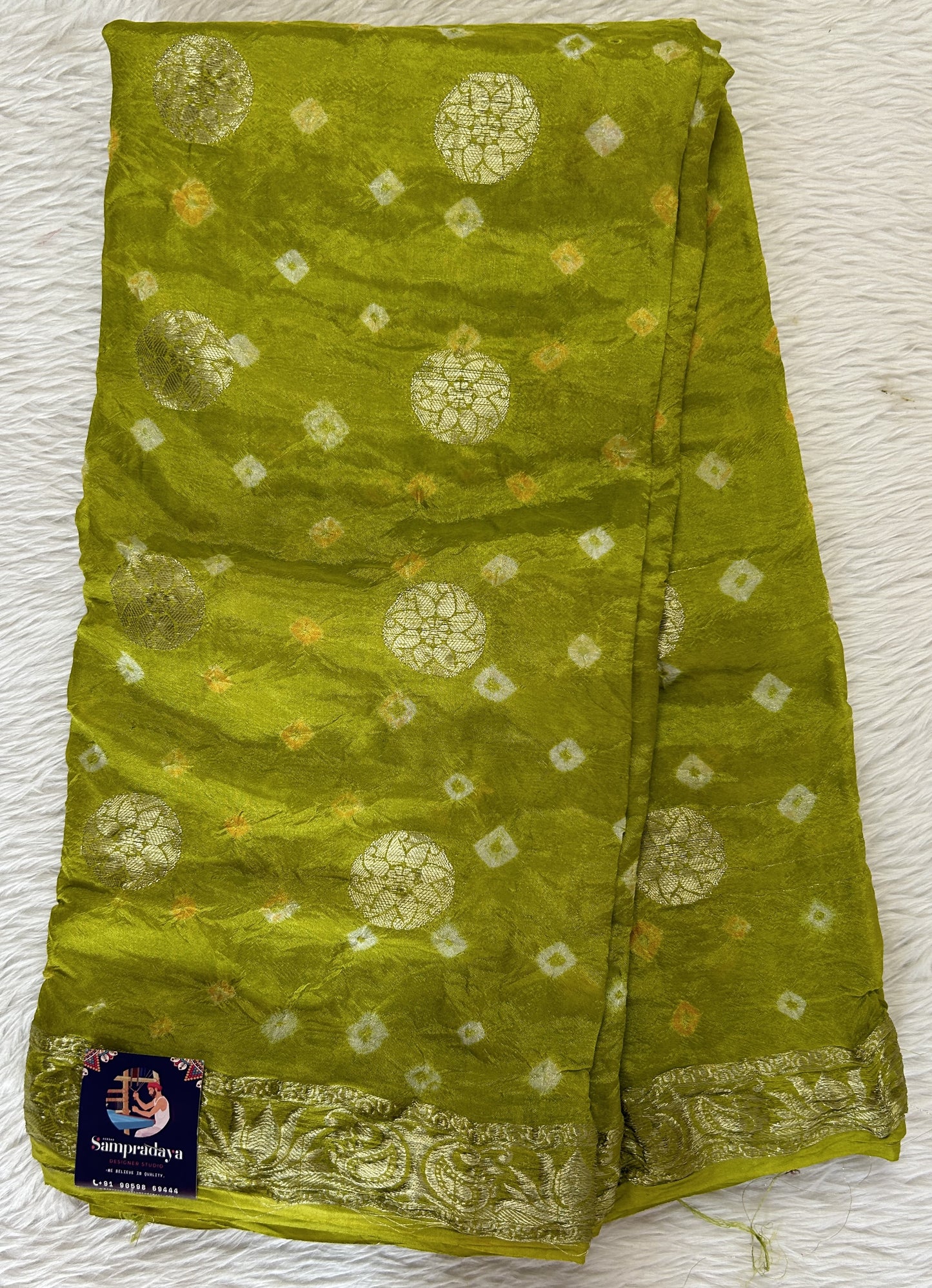 Bandhani Saree Parrot Green Colored Complemented with a Zari Border. - Sampradaya Designer Studio