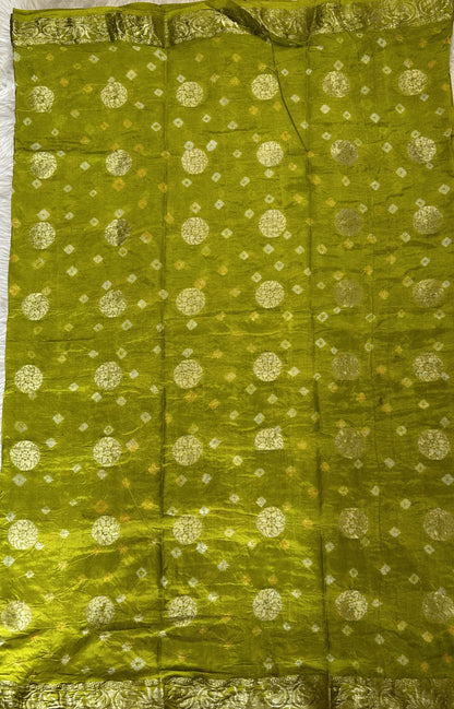 Bandhani Saree Parrot Green Colored Complemented with a Zari Border. - Sampradaya Designer Studio