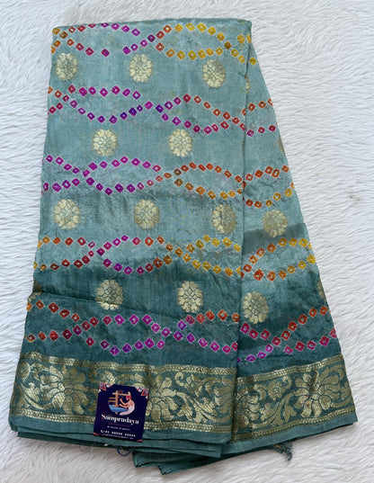 Bandhani Saree Sea Green Colored Complemented with a Zari Border. - Sampradaya Designer Studio