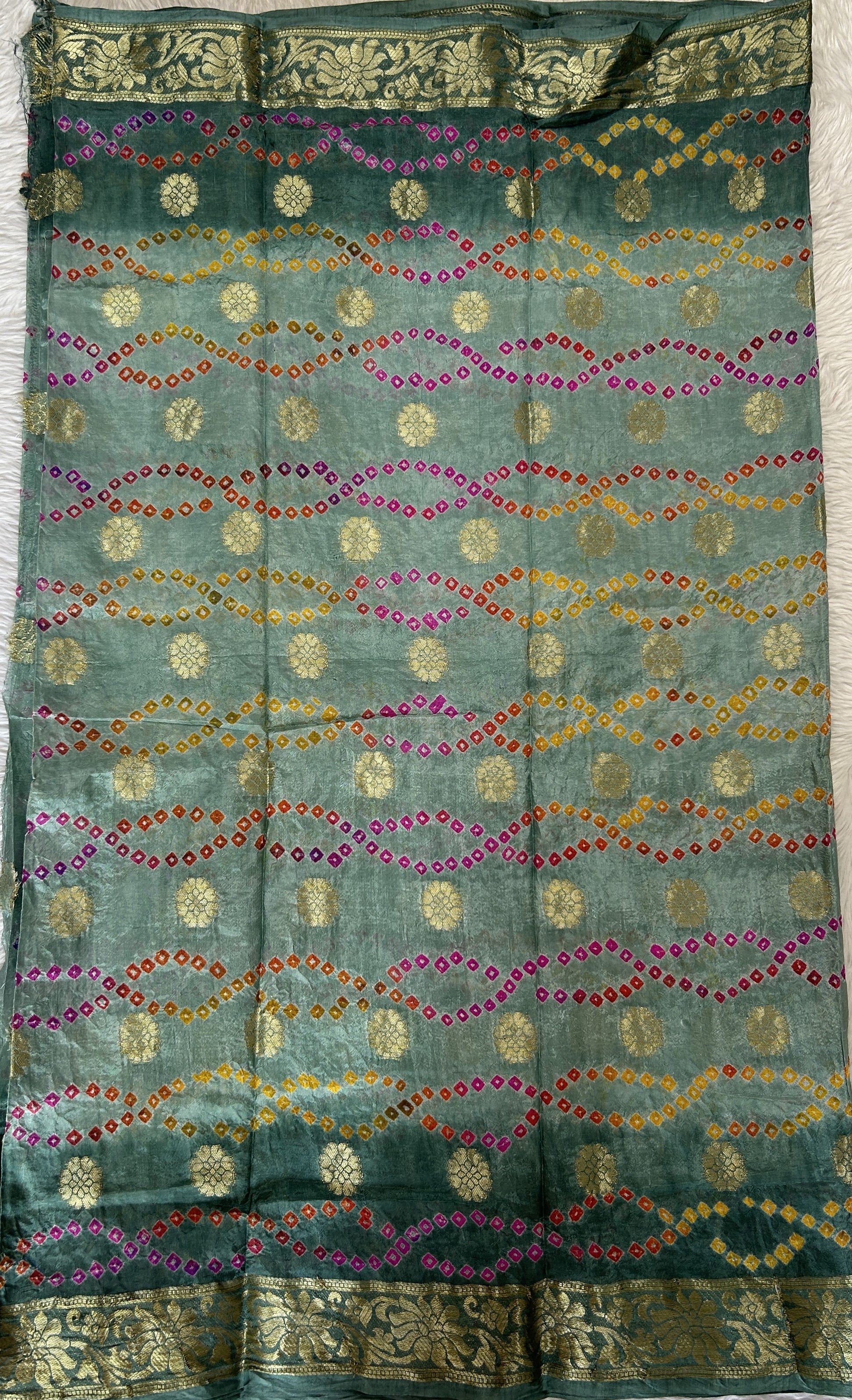 Bandhani Saree Sea Green Colored Complemented with a Zari Border. - Sampradaya Designer Studio