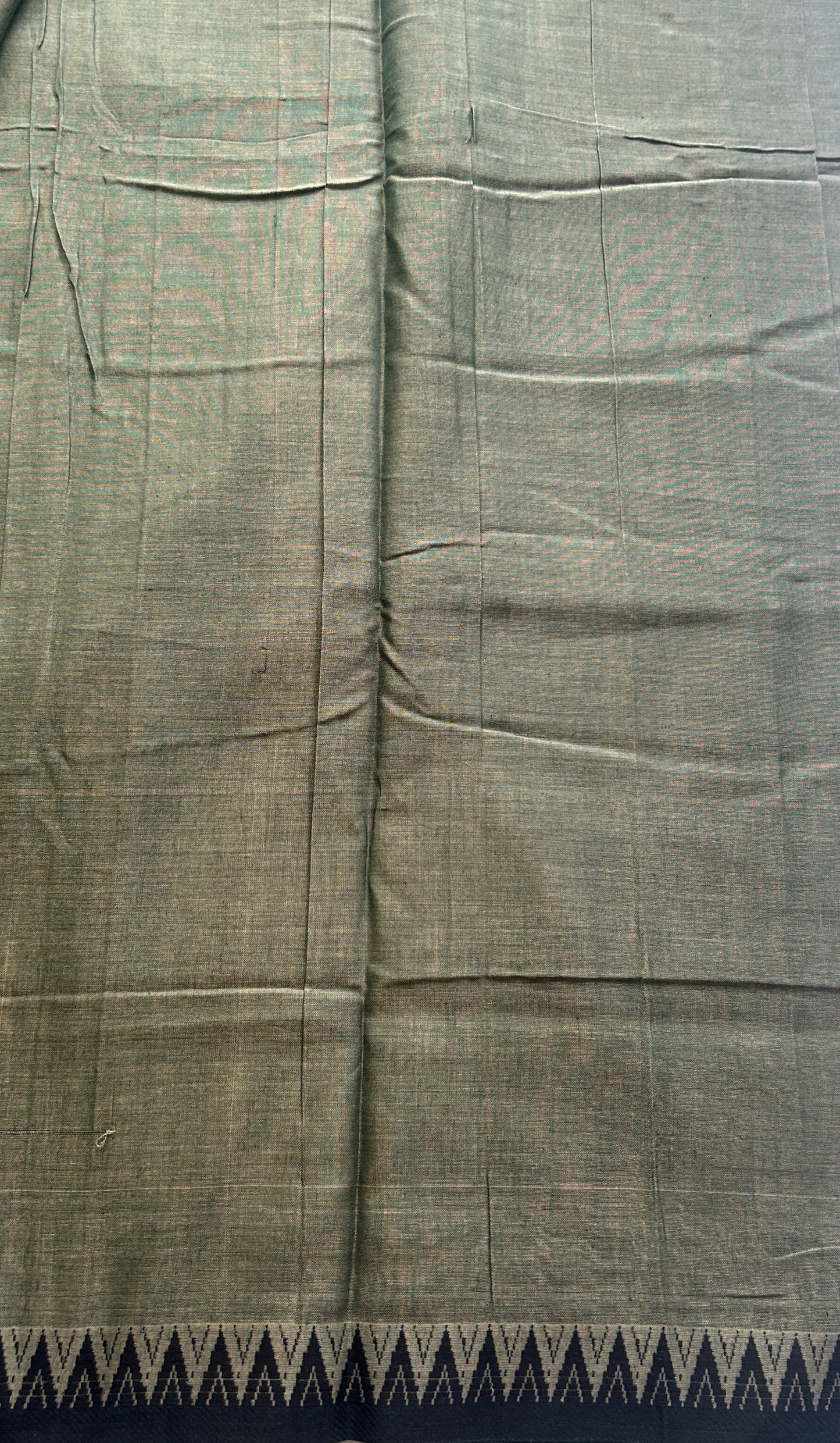 Narayanpet Cotton Saree Olive Green Colored Complemented with a Black Thread Border.