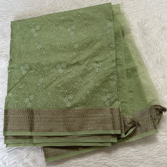 Semi Tussar Silk Saree Green colored complemented with a Zari border. - Sampradaya Designer Studio